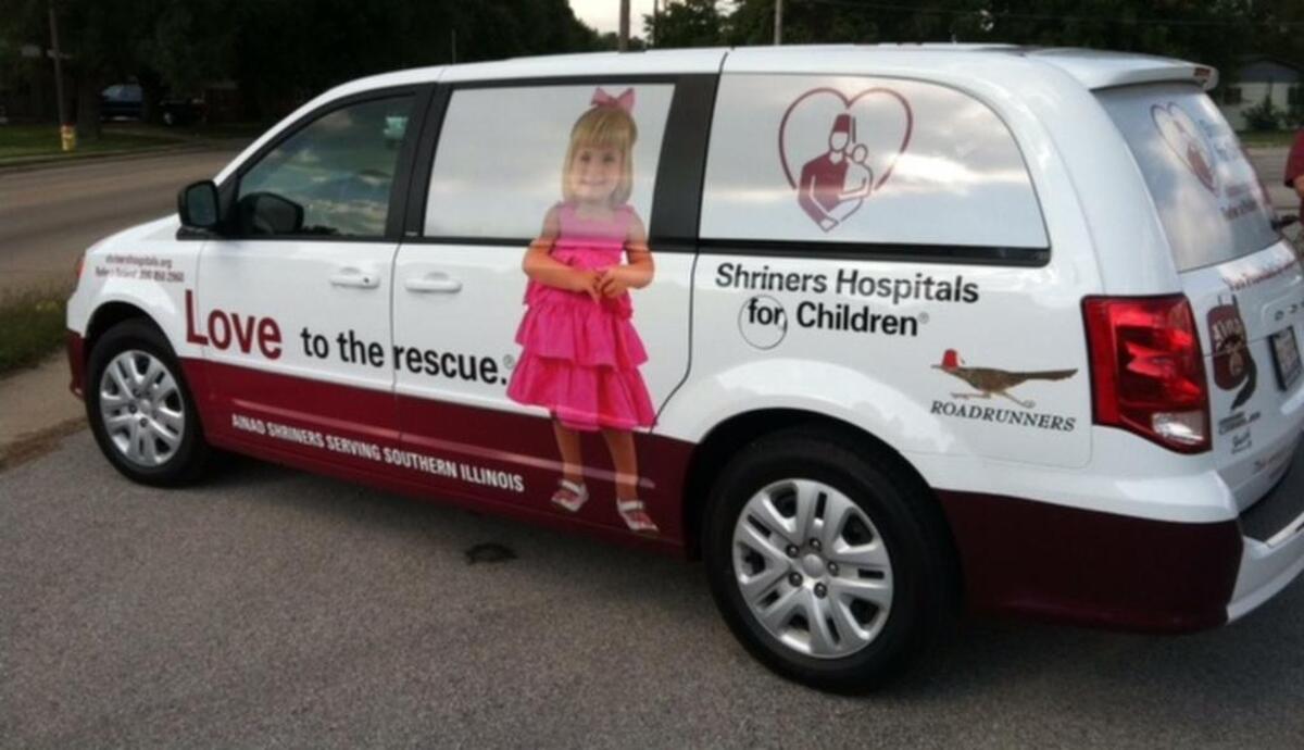 Emma Frick, now 5, of Belleville, posed several years ago for a photo that still appears on a van that transports patients to Shriners Hospital for Children in St. Louis.