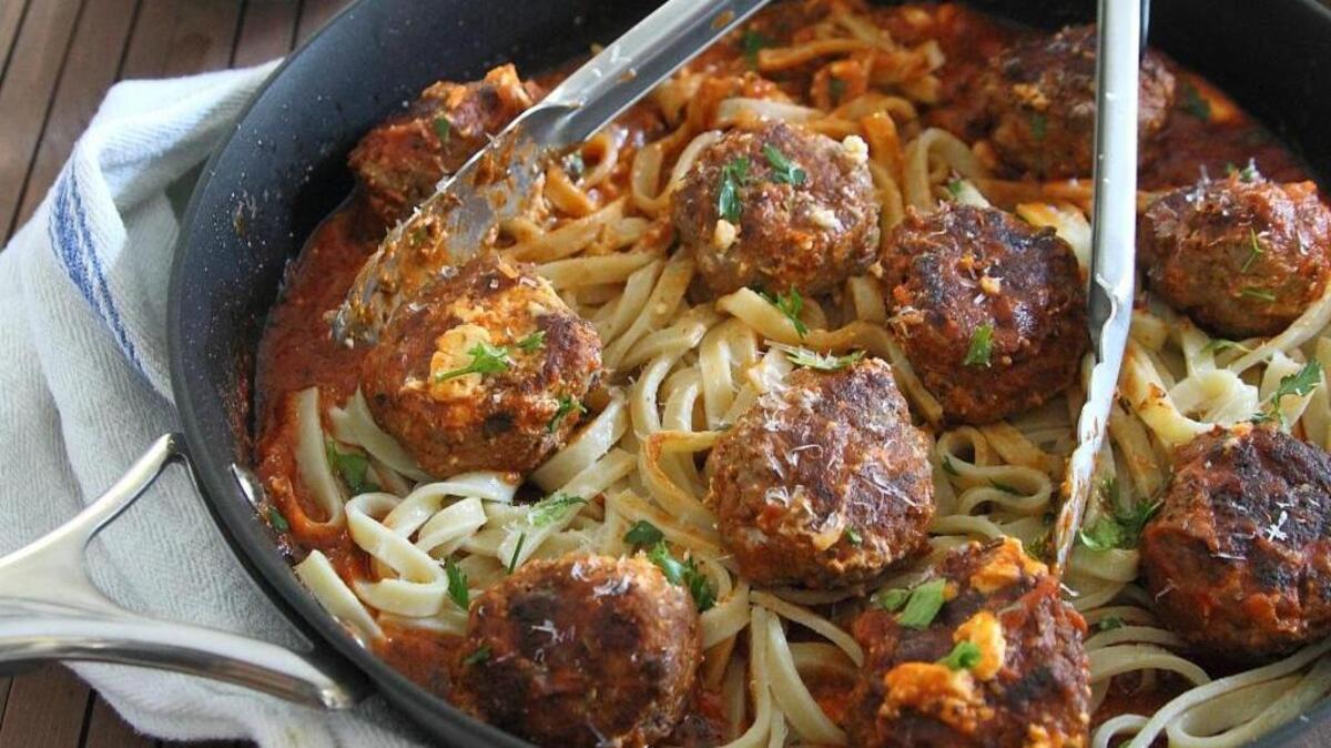 This fettuccine has cream cheese in the marinara sauce and a bit in the meatballs.