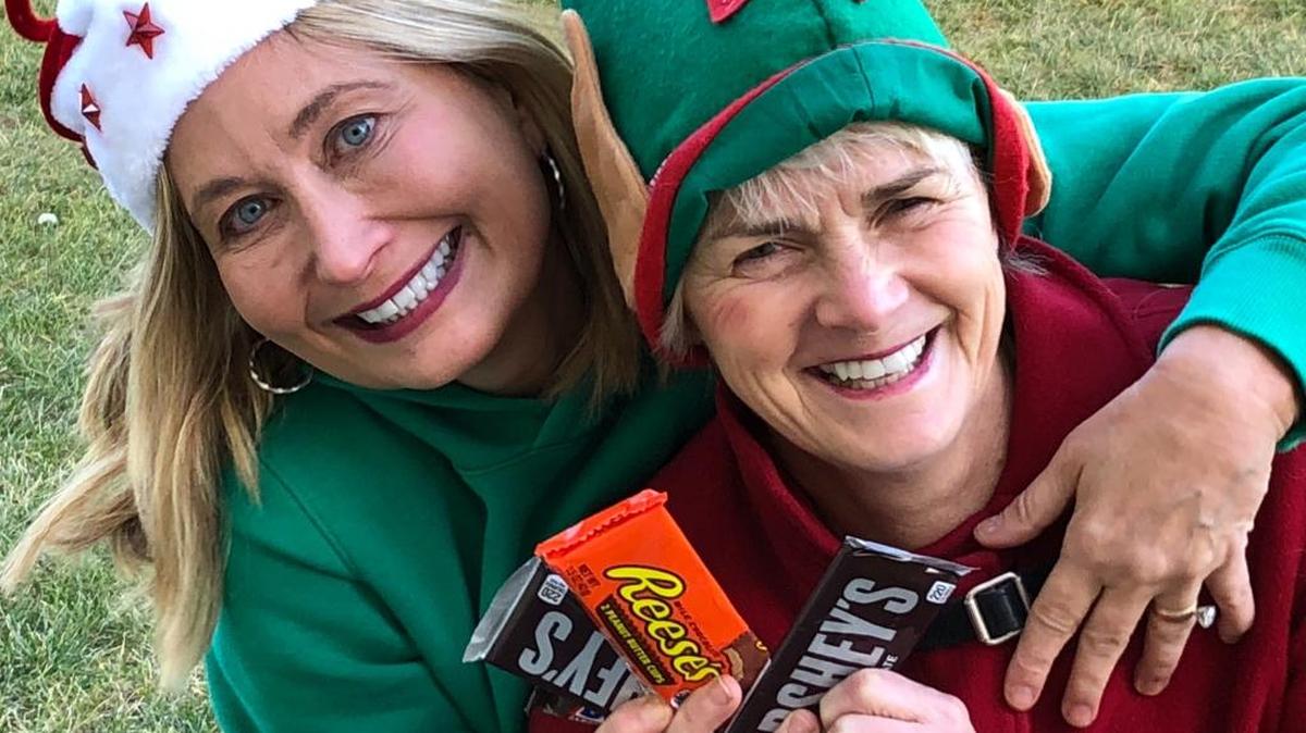 Michelle Meehan Schrader gets into the Christmas spirit with her chocolate enabler, Rita Menke.