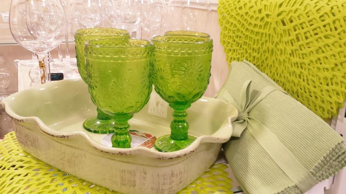 Brighten up your table for spring with green accents, such as embossed glasses, casserole dish, placemats and napkins from Home Goods in Fairview Heights.