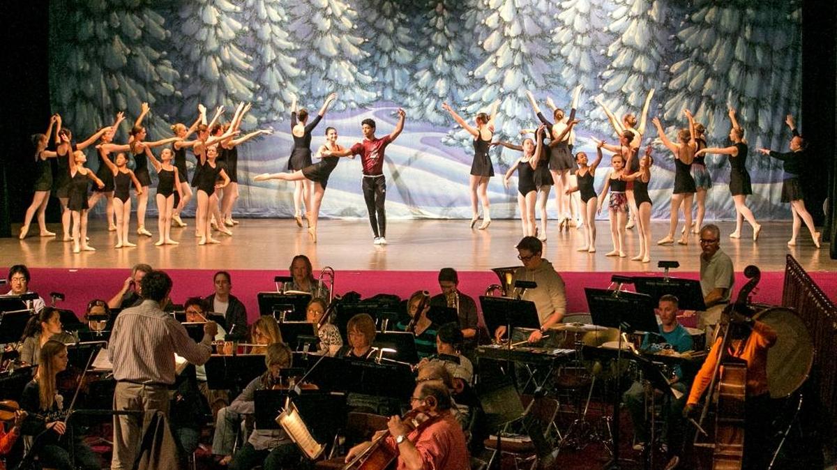 Dancers and musicians from Belleville School of Ballet and Belleville Philharmonic Orchestra rehearse “The Nutcracker,” which will be performed this weekend at the Scottish Rite Bodies Theatre.