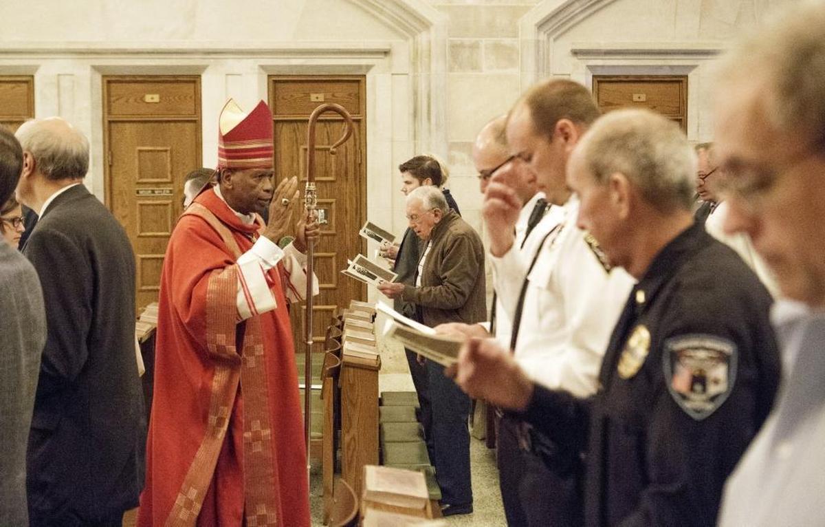 Bishop Edward K. Braxton initiated the practice of holding a Red Mass each fall to mark the start of the U.S. Supreme Court session . It celebrates the work of lawyers, judges, police and other professionals who serve the cause of justice. He’s shown here in 2016 at the Cathedral of St. Peter in Belleville.