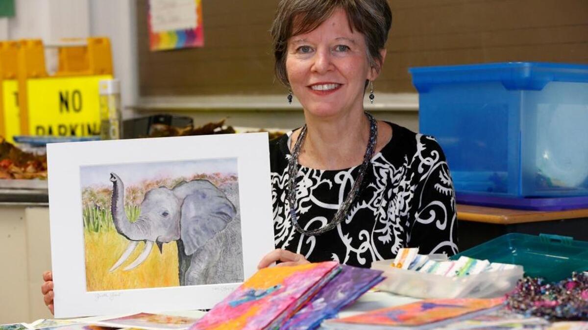Maribeth Clancy shows some of her work that will be for sale Saturday at Belleville’s Art and Wine Walk.