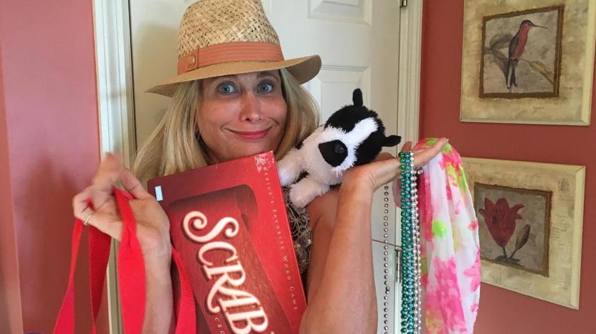 Michelle Meehan Schraders holds a few things that she found in her closet.