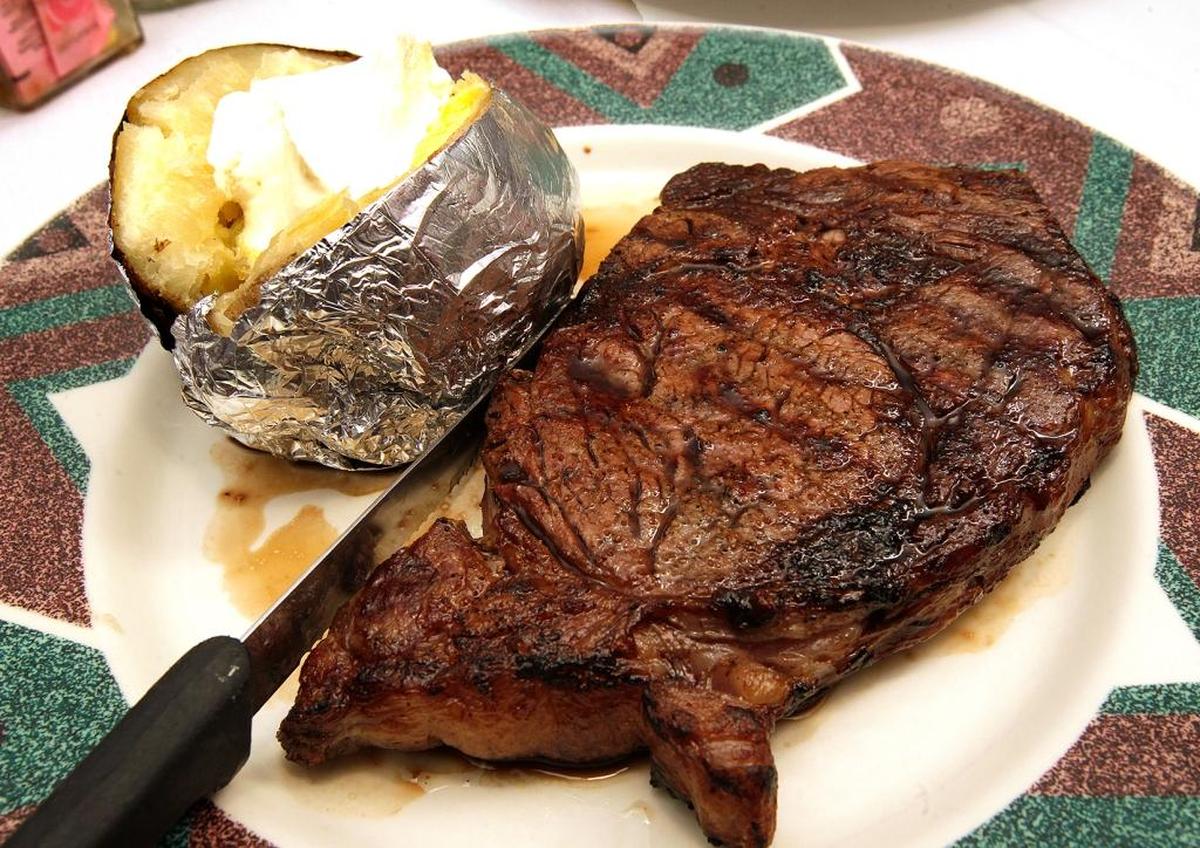 Valentine's Restaurant in Freeburg serves a 14-ounce ribeye steak seasoned with spices from a family recipe and drizzled with soy-based marinade, $24.95 with two sides.