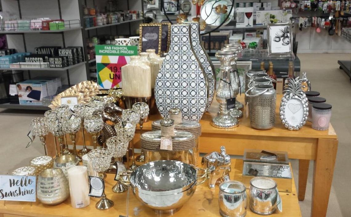 Backstage at Macy’s includes a home decor section. Merchandise on this display table are under $20.