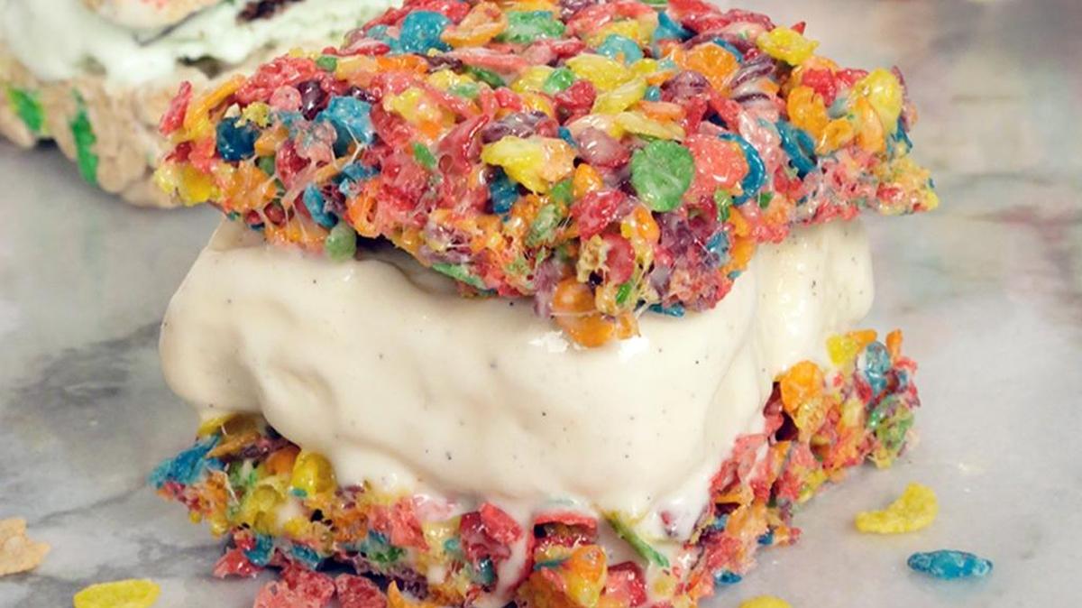 Fruity Pebbles breakfast cereal is used to first make a Rice Krispie-style treat. Then the ice cream is added for even more of a treat.