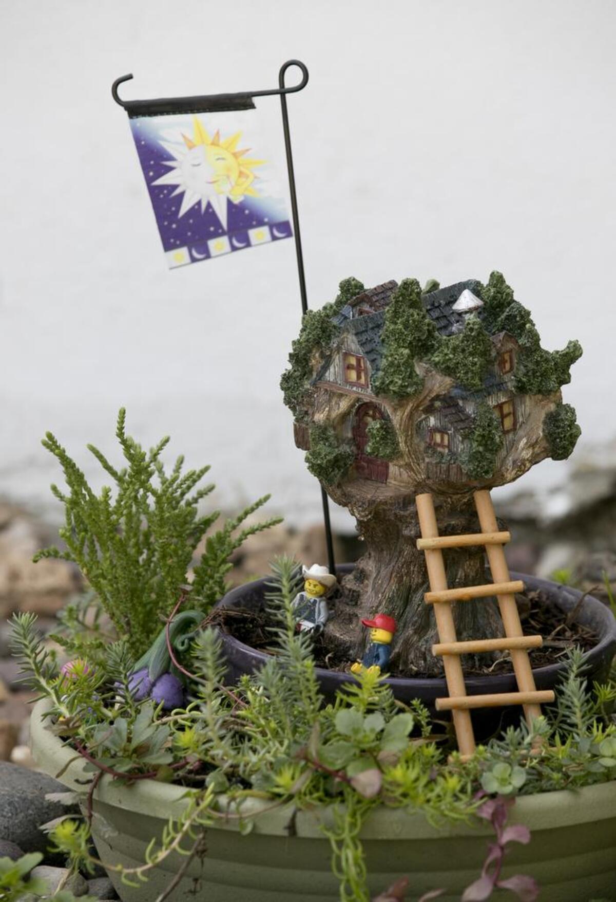 A few Lego character blocks have taken residence in the fairy garden at the home of Tim Gore and Steven Wilson. They will be part of the Gardens In Bloom tour on June 3.