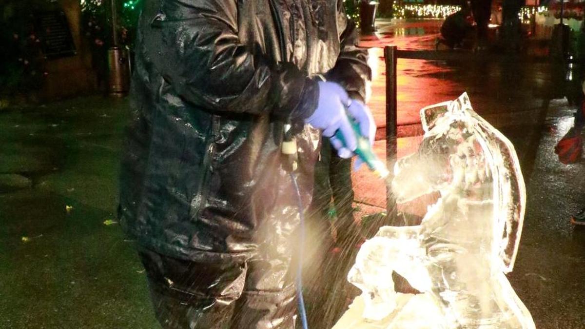 Eric Snider, of Chip Off The Block Ice Carvings in Staunton, carves a prancing zebra from a block of ice during the St. Louis Zoo Wild Lights, which runs through Dec. 30. It took him about an hour to create the ice sculpture.