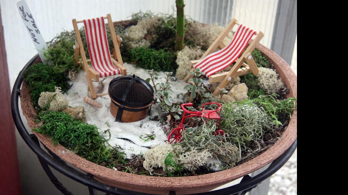 
This beach scene miniature garden is the work of Susan Hellige, of Creekside Gardens in Collinsville. It reminds her of Florida. 
