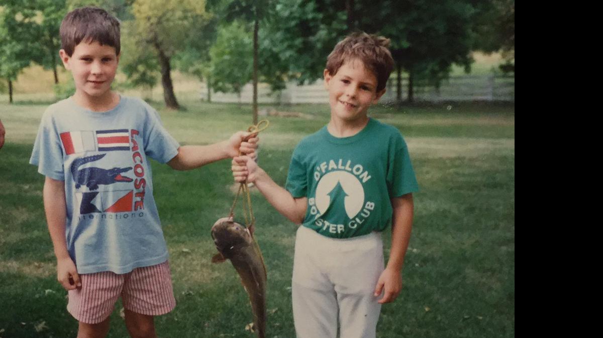 
Daddy’s buddies with a monster catfish we caught.
