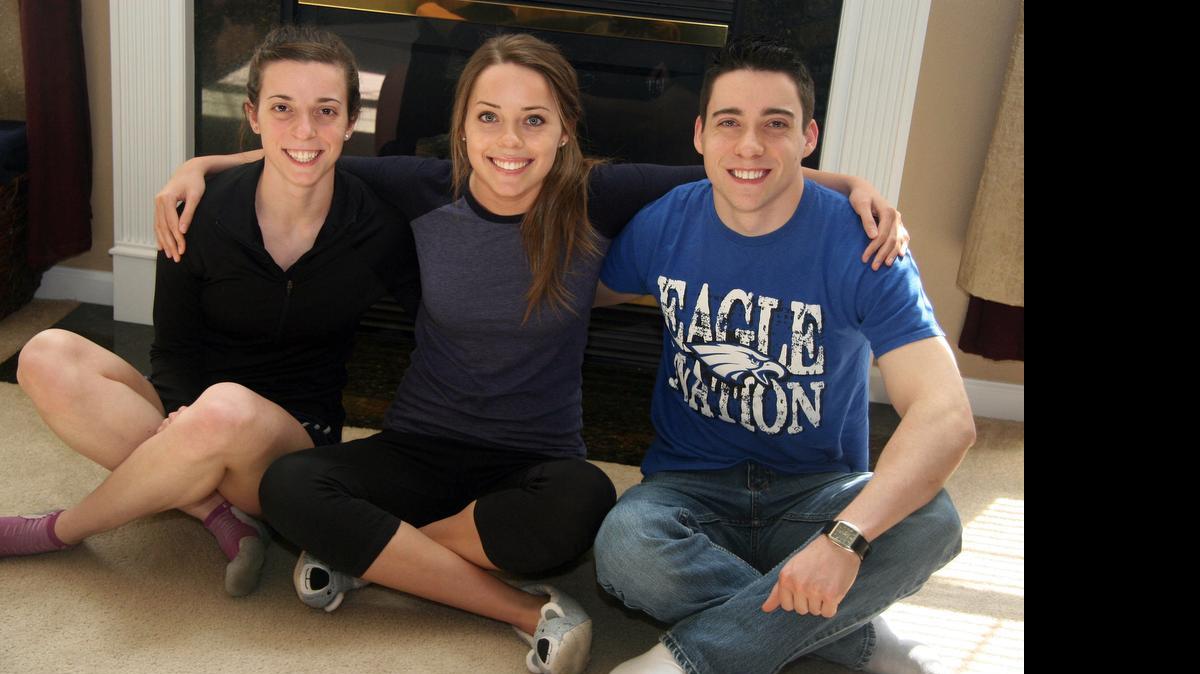 
Triplets Ashley Myers, left, Brittany, and Cory, 18, of Columbia, graduate from high school this month and head in different directions.
