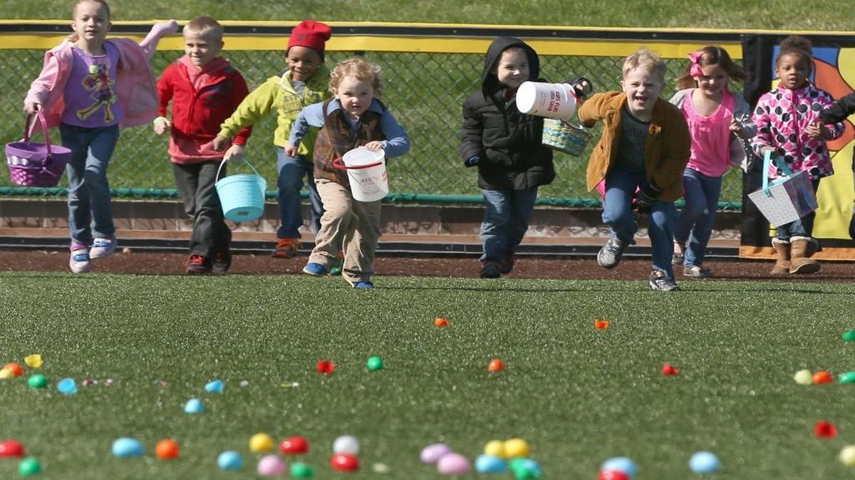 A group of 5- and 6-year-olds takes off in last year’s Gateway Grizzlies egg hunt at GCS Ballpark in Sauger.