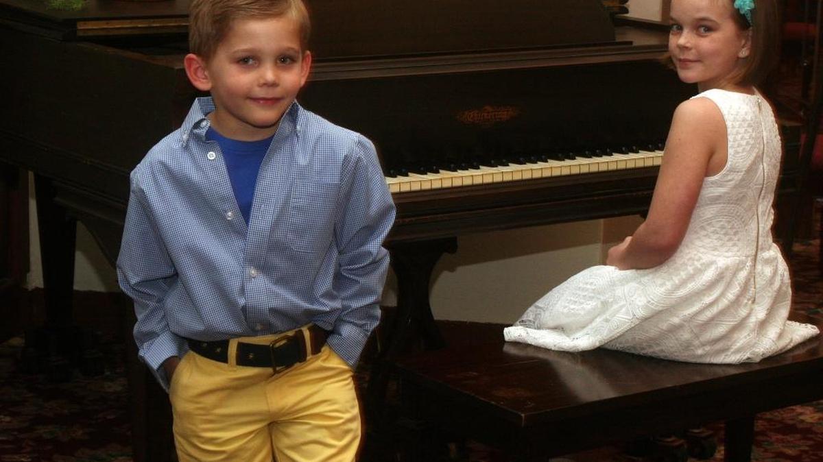 Wyatt Dahm, 5, and Cora Sinn, 9, will be in the March 5 style show and luncheon sponsored by Optimist Club of Belleville. They are among 15 models who range from 6 months to their 60s. They are wearing clothes from Dillard’s.