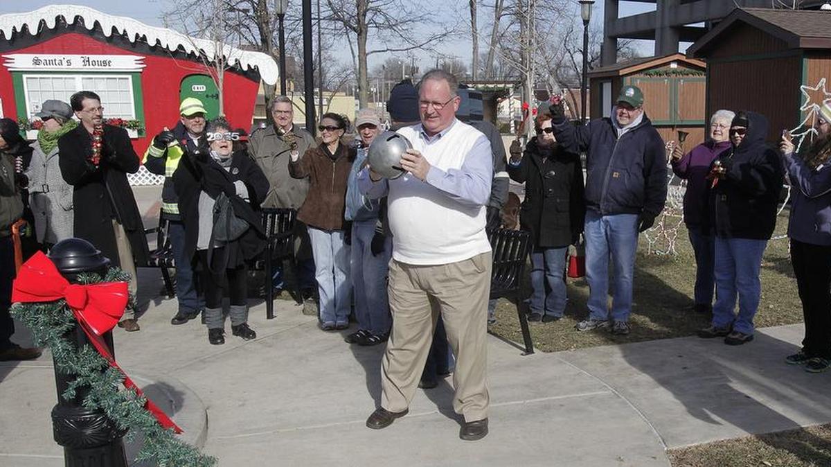 People gathered on the northeast quadrant of Public Square at noon on New Year’s Day to ring in 2015 using a variety of bells of all sizes and sounds. Belleville Mayor Mark Eckert (center) lead the bell-ringers for two minutes of ringing.