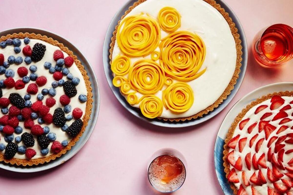 Easy Fruit Tart with Pecan Cookie Crust can be topped with fresh strawberries, berries and even curled slices of mango.