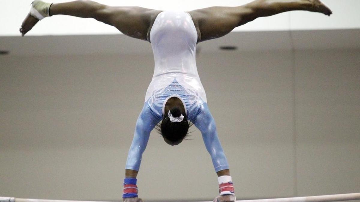 A young gymnast competes at a past Gateway Challenge meet.