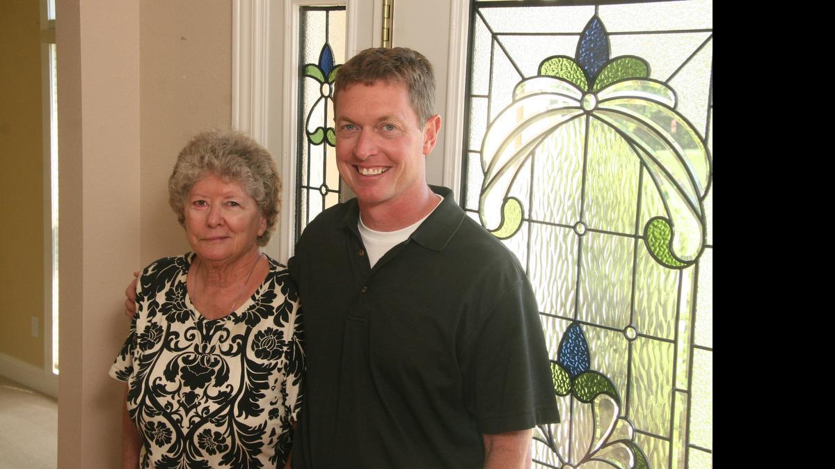 
Joyce Johnston and son Gary Johnston have worked together for more than 20 years. They started their business, Johnston Realty Inc., in 1993. “For our Christmas party, we don’t buy gifts,” said Joyce of her six-person office. “We buy gifts for the needy and deliver on Christmas Eve.” 
