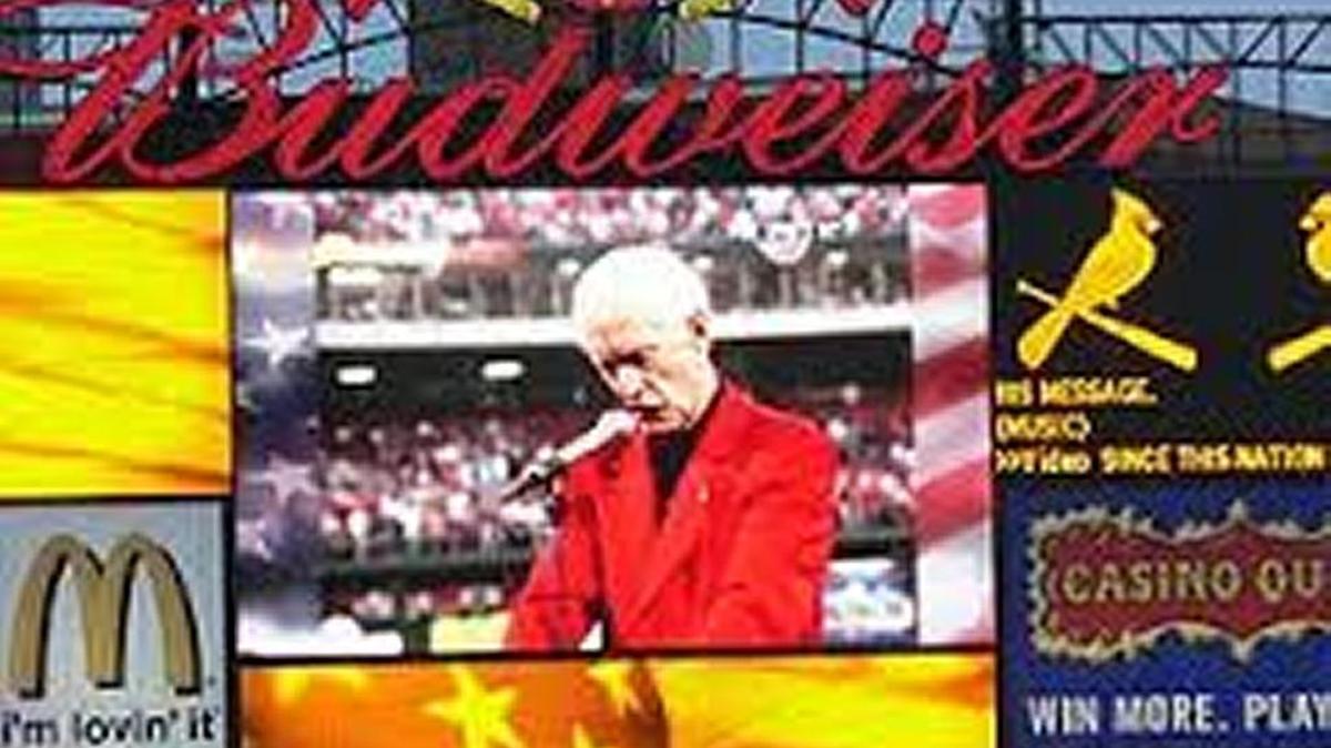 
The Busch Stadium scoreboard and millions of TV sets around the country showed Jack Buck reading his poem in 2011.
