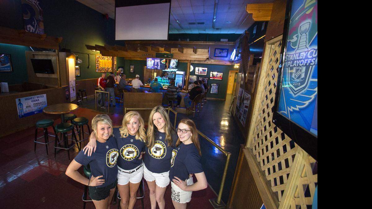 
Ready for a crowd of St. Louis Blues’ fans, Bindy’s waitresses Kristen Cochran, Taylor Lord, Heather Kielty, and Heather Wise pose before the playoff crowd rush.
