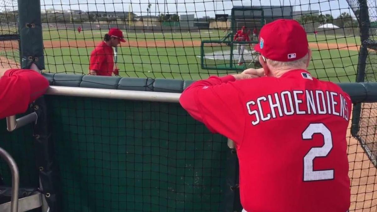 Red Schoendienst watches batting practice at Cardinals spring training.