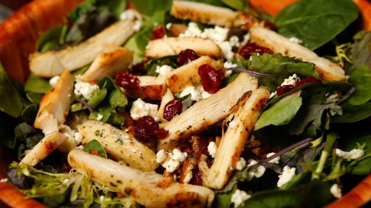 Spinach salad with craisins, feta cheese and grilled chicken, $9.99, at Back Street Wine and Dine in Hecker.