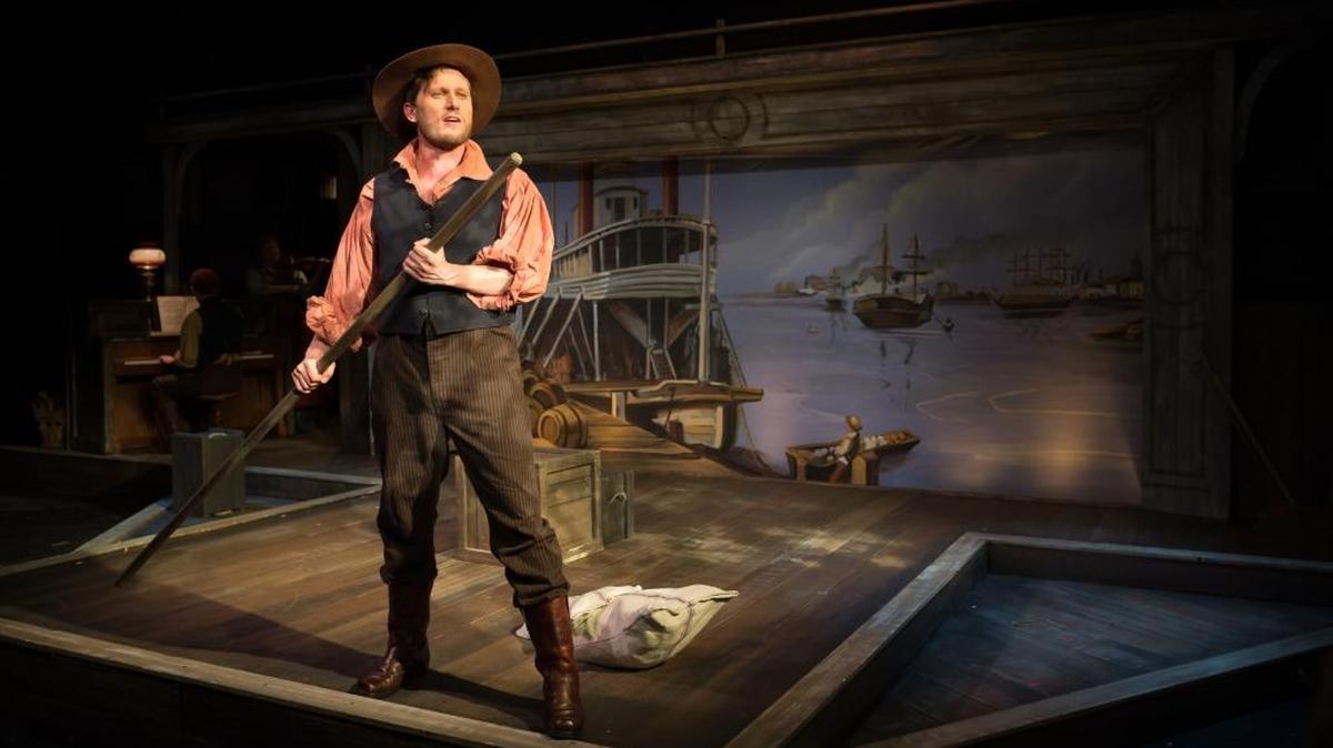 John Banvard (PJ Griffith) sets off on a his journey on the Mississippi River in a scene from “Georama.” A handpainted georama scrolls behind him.