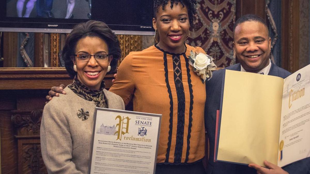 Hettie Barnhill, center, receives the Shirley Chisholm Women of Excellece award from Brookly Burrough council member Laurie Cumbo and New York State Sen. Jesse Hamiliton III on March 18 in Brooklyn, N.Y.