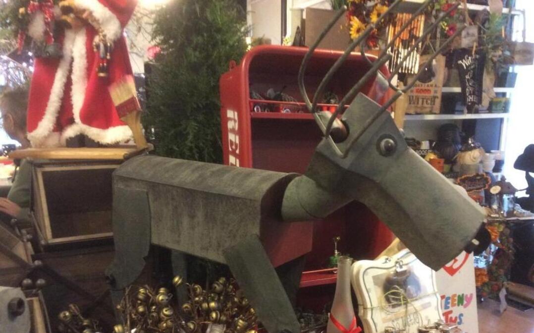 A metal moose is on the loose at Grimm & Gorly. Look closely and you’ll see that his hooves are bells and his tail is a paint brush.