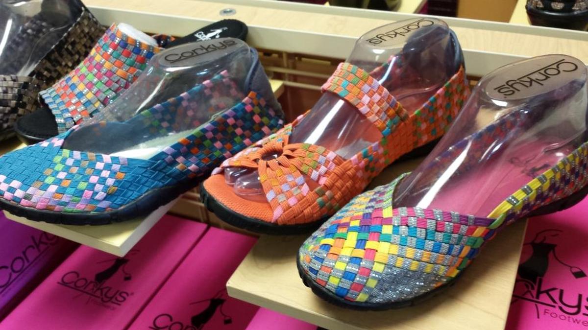 Colorful footwear made by Corkys can be found at Carolyn’s Shoes in O’Fallon.