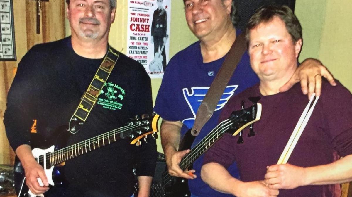 Symptoms reunited at a recent rehearsal, from lef: Mark Snyder, Steve Reeb and Tom Pearson.
