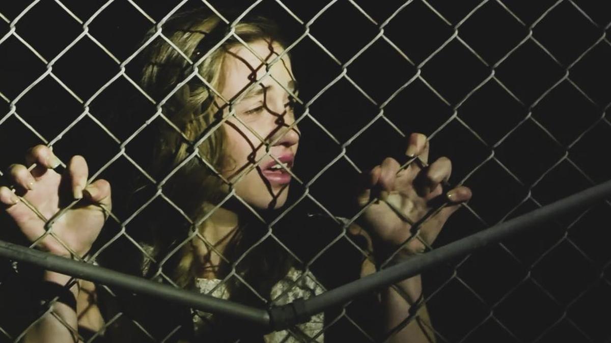 Elle (Abigail Duhon) desperately searches for a way out of a Greek brothel in “Caged No More.” Molly Venzke wrote the book and the screenplay for the movie.