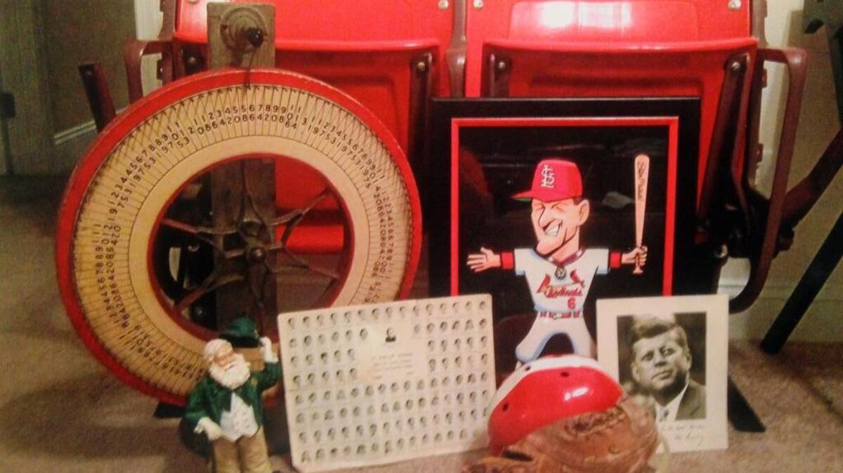Keepers: When Terry Mackin moved recently, he got rid of some things, but not his treasures that include Grandpa’s roulette wheel, anything related to Hall of Famer Stan Musial, seats from the old Busch Stadium and a photo of President Kennedy.