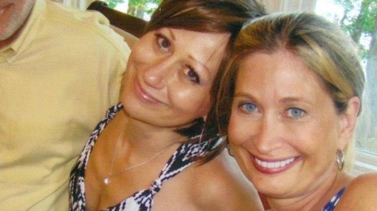 Michelle Meehan Schrader (right) and her twin sister Melanie (center).