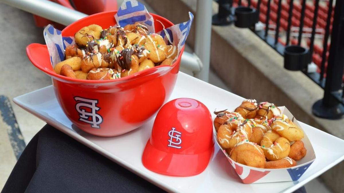 You can just about duplicate the Dinger’s Donuts sold at Busch Stadium in St. Louis by using the Fried Mini Doughnuts recipe from the Food Network Kitchen. You’ll have to scout around to find some Cardinal’s helmets to put them in, though.