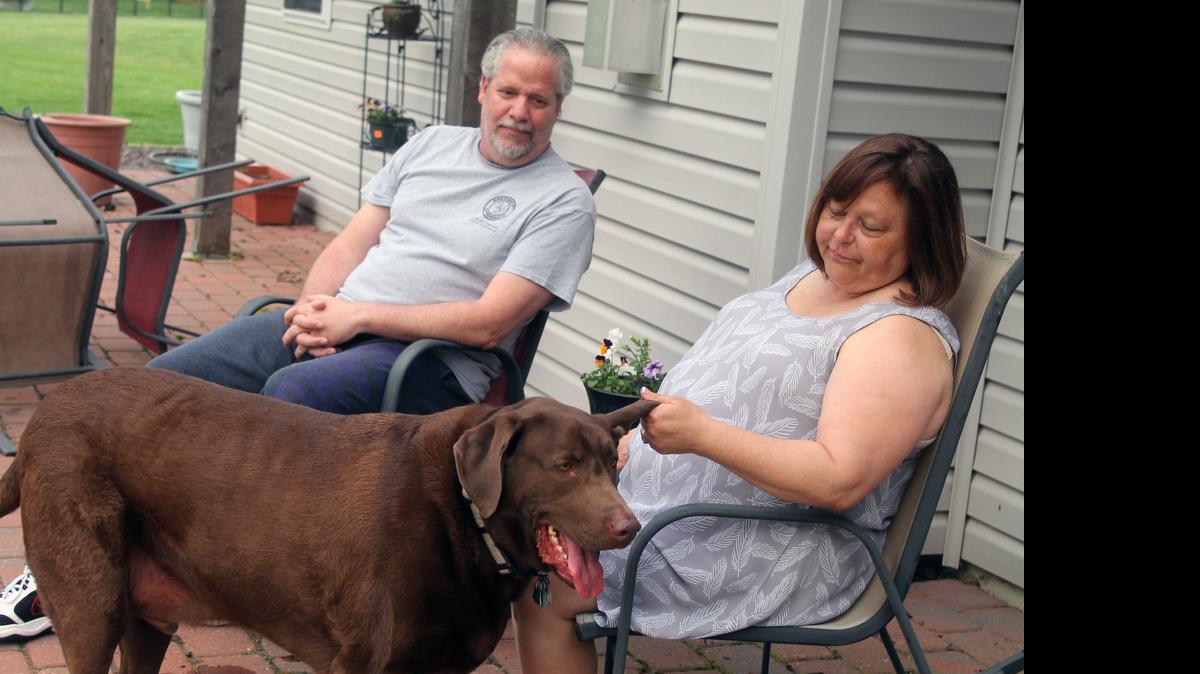 
Doug Smith and wife Adrienne, of Mascoutah, take a break from studies to sit on their patio. They will graduate from McKendree University May 9. 
