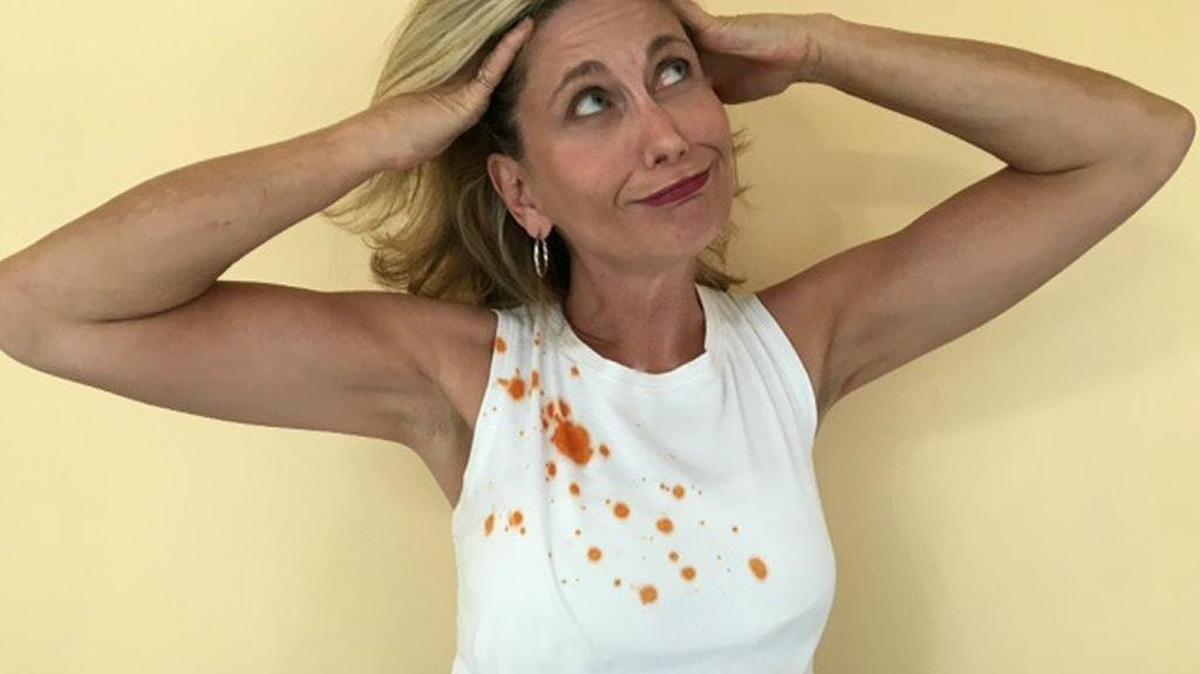 Michelle Meehan Schrader shows what her stained white dress looked like when she met her future husband.