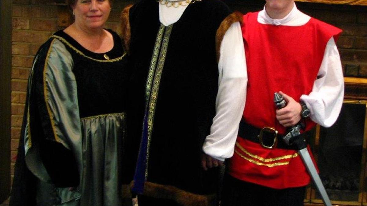 Cast members Jean, Steve and John Wilson pose in their Renaissance-style costumes for “The Spirit of Christmas.”