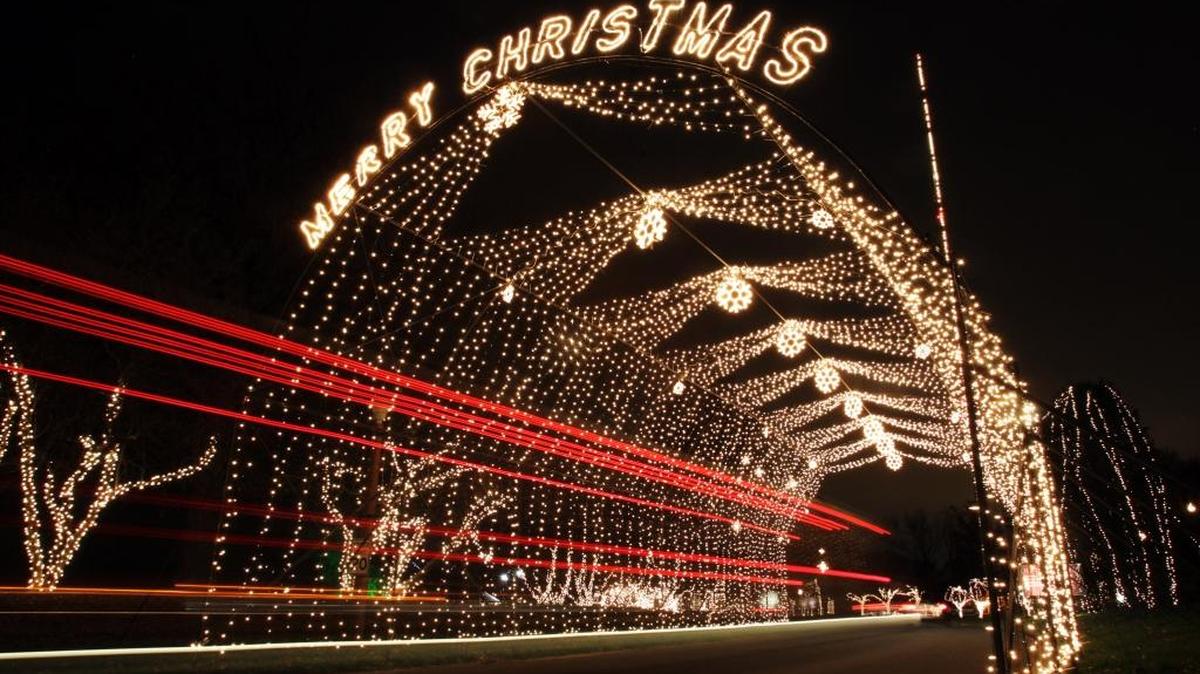 Tail lights streak through one of the displays at the The Way of Lights. The National Shrine of Our Lady of the Snows is located on Illinois State route 15 east and De Mazenod Dr. in Belleville.
