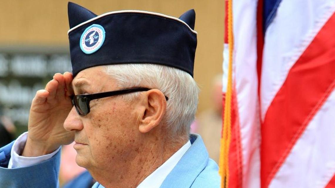 Korean War veteran Bill Juergens of Shiloh salutes Sunday during the 14th Annual Veteran’s Day ceremony in downtown Belleville.