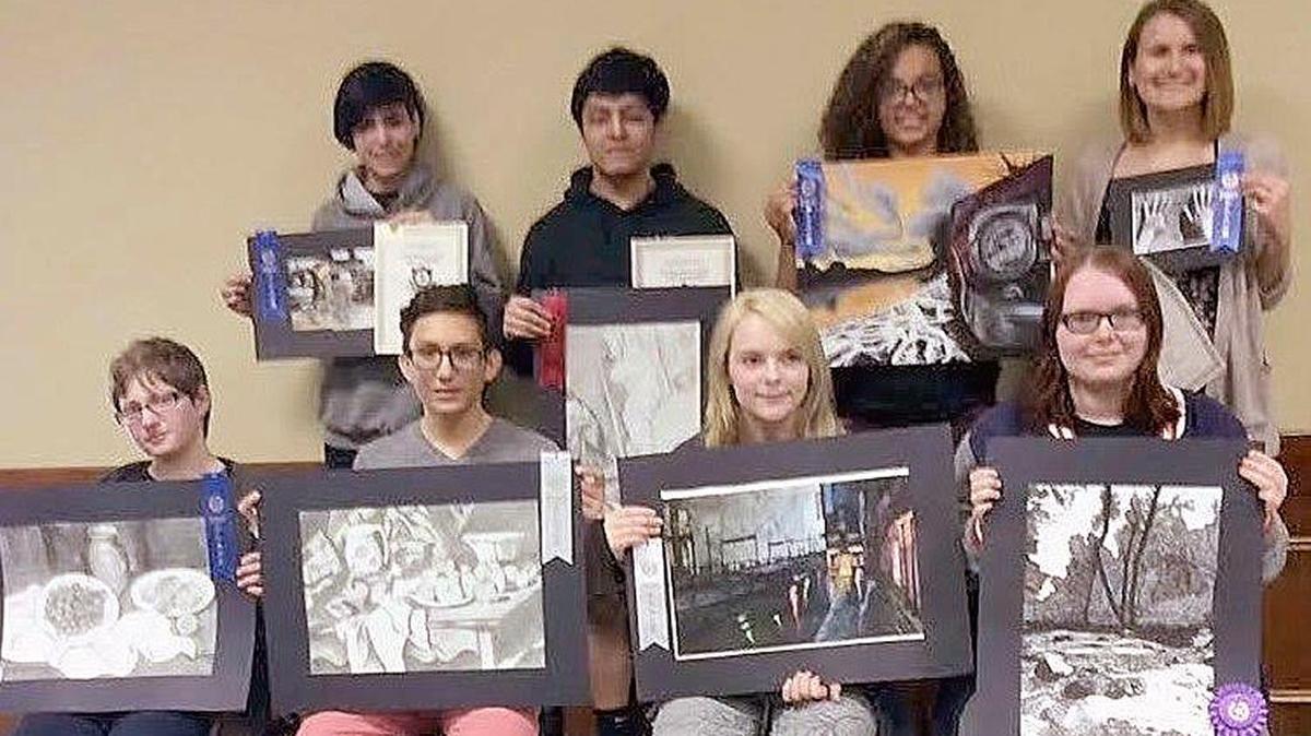 Tori Barrett, standing left, Hector Alcazar, Gabby Morgan, Tory Appel; and seated from left, Zoe Cope, Edgar Acevedo, Jewleah Heck and Rachel Harrison were among 12 winners of the 2016 Collinsville Woman’s Club Art Contest.