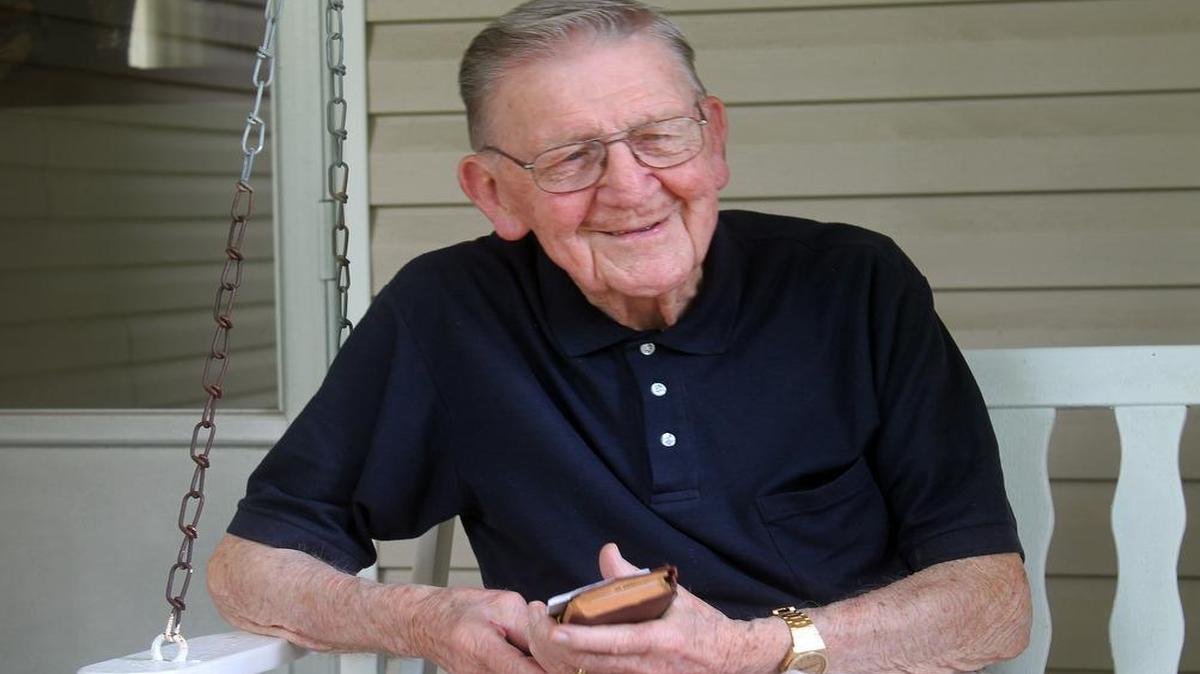 
Glenn Holtz, 93, of Belleville, holds the small leather-bound Bible that he carried in his duffle bag while served in the U.S. Army during World War II.
