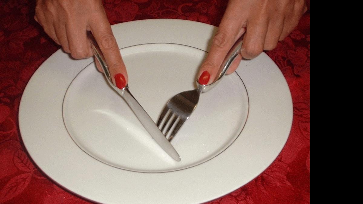This is the proper way to hold your knife and fork when you are cutting something on your plate.
