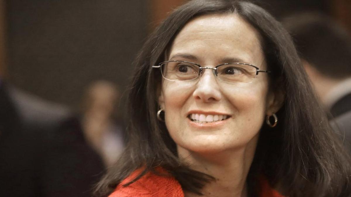 In this Jan. 29, 2014 photo, Illinois Attorney General Lisa Madigan looks during the State of the State Address in the House chambers at the Illinois State Capitol in Springfield Ill. Illinois Gov. Bruce Rauner tried to expand his web of blame for the historic state budget stalemate last week by including Attorney General Lisa Madigan.
