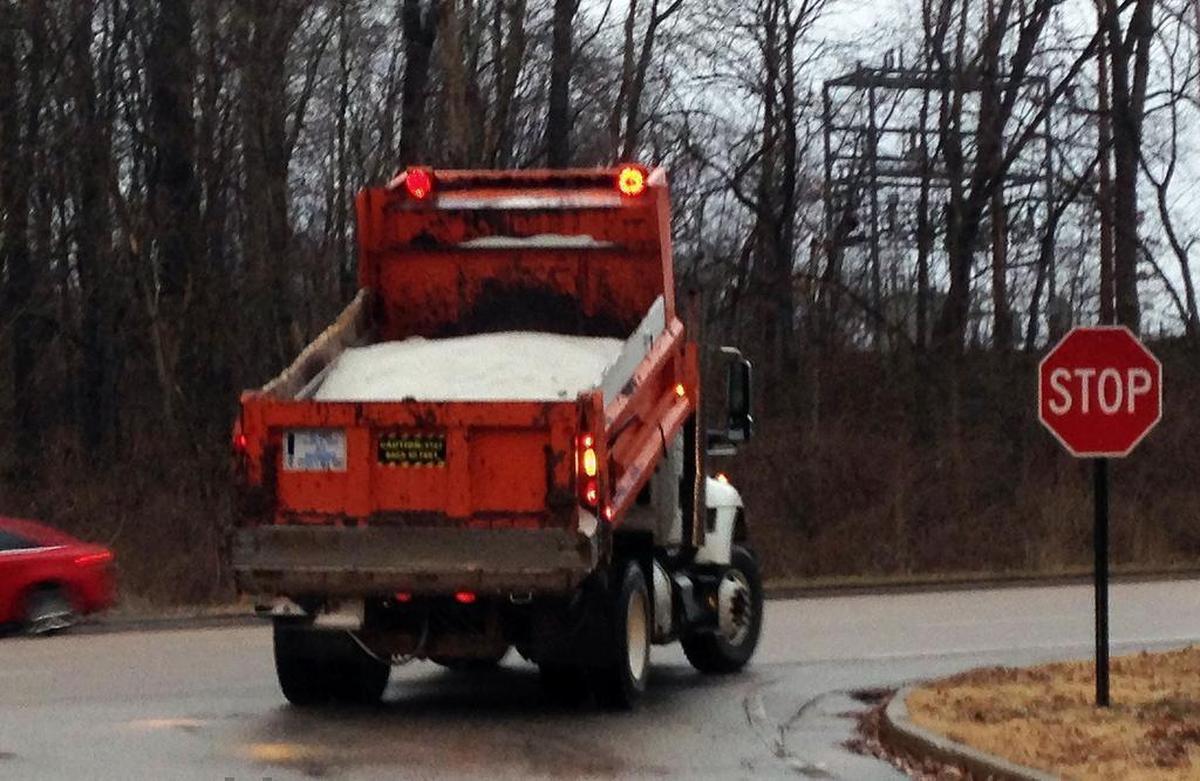Salt trucks were pressed into service Sunday as a wintry mix of ice and sleet covered the St. Louis area and metro-east.