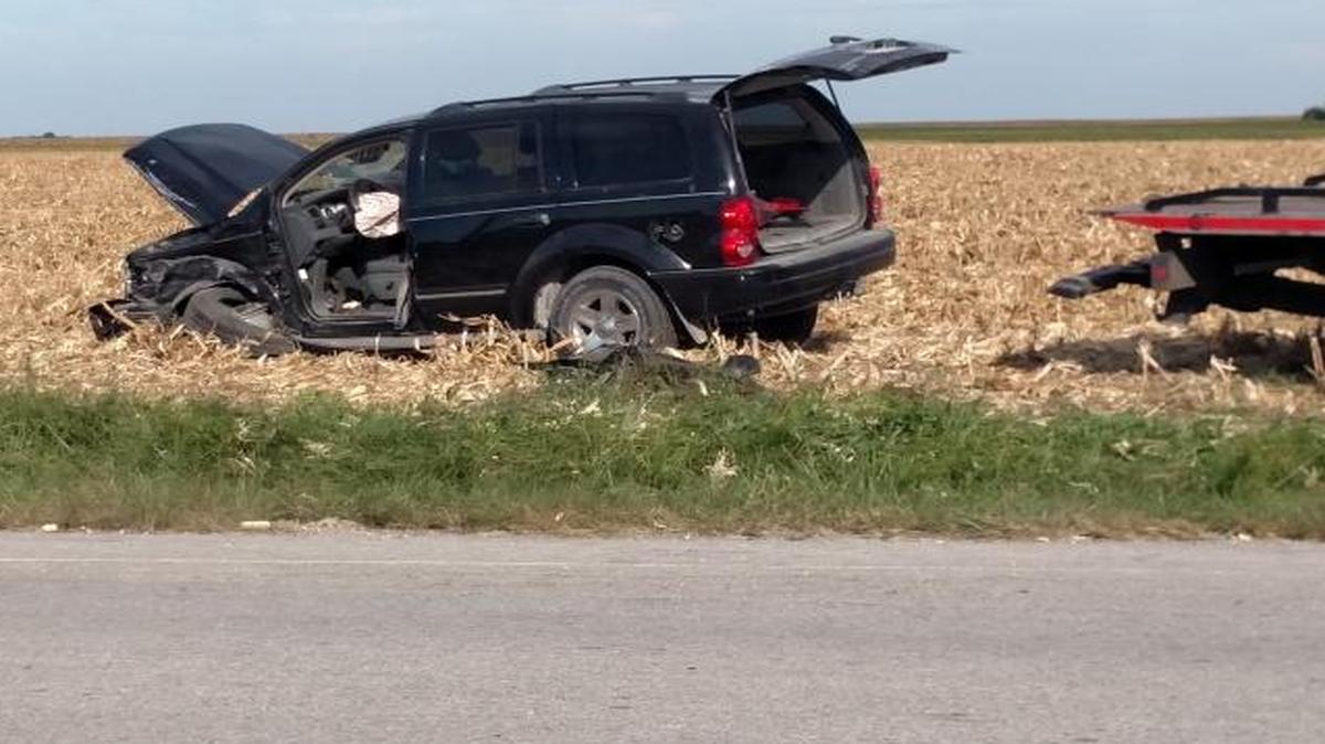 
A tow truck prepares to load up a damaged Dodge Durango involved in a two-vehicle crash on Illinois 4 at Heintz Road near St. Libory Friday afternoon. 
