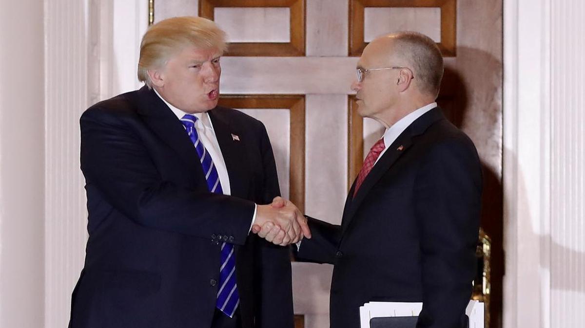 Andy Puzder, right, is a former St. Louis lawyer who attended Washington University.