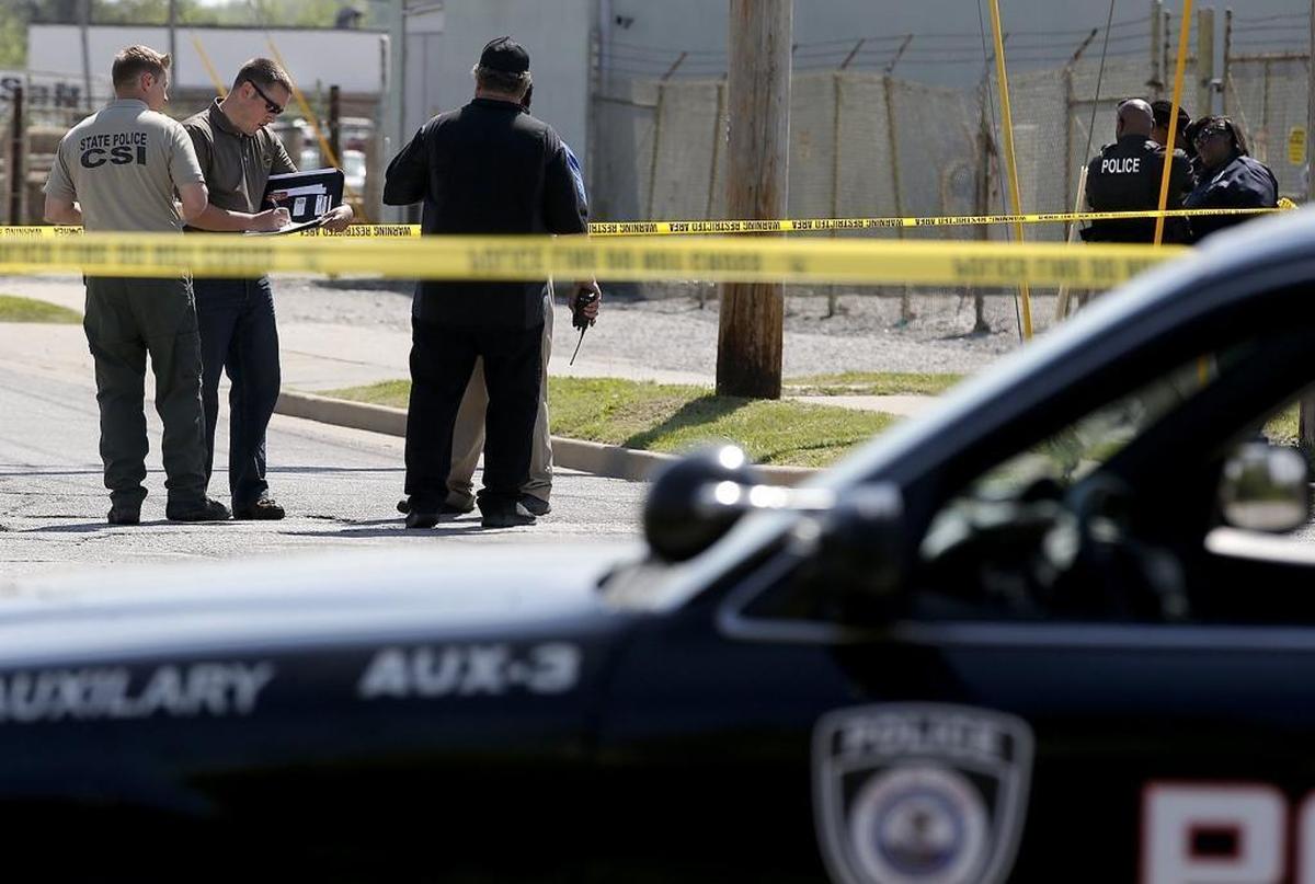 Police investigate a shooting at 20th Street and Ridge Avenue in East St. Louis. The city has had 32 homicides so far this year.