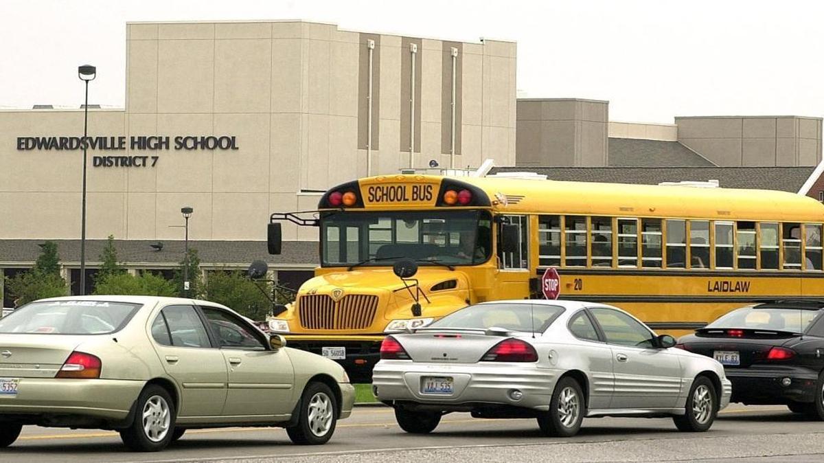 A school bus departs Edwardsville High School in this file photo.