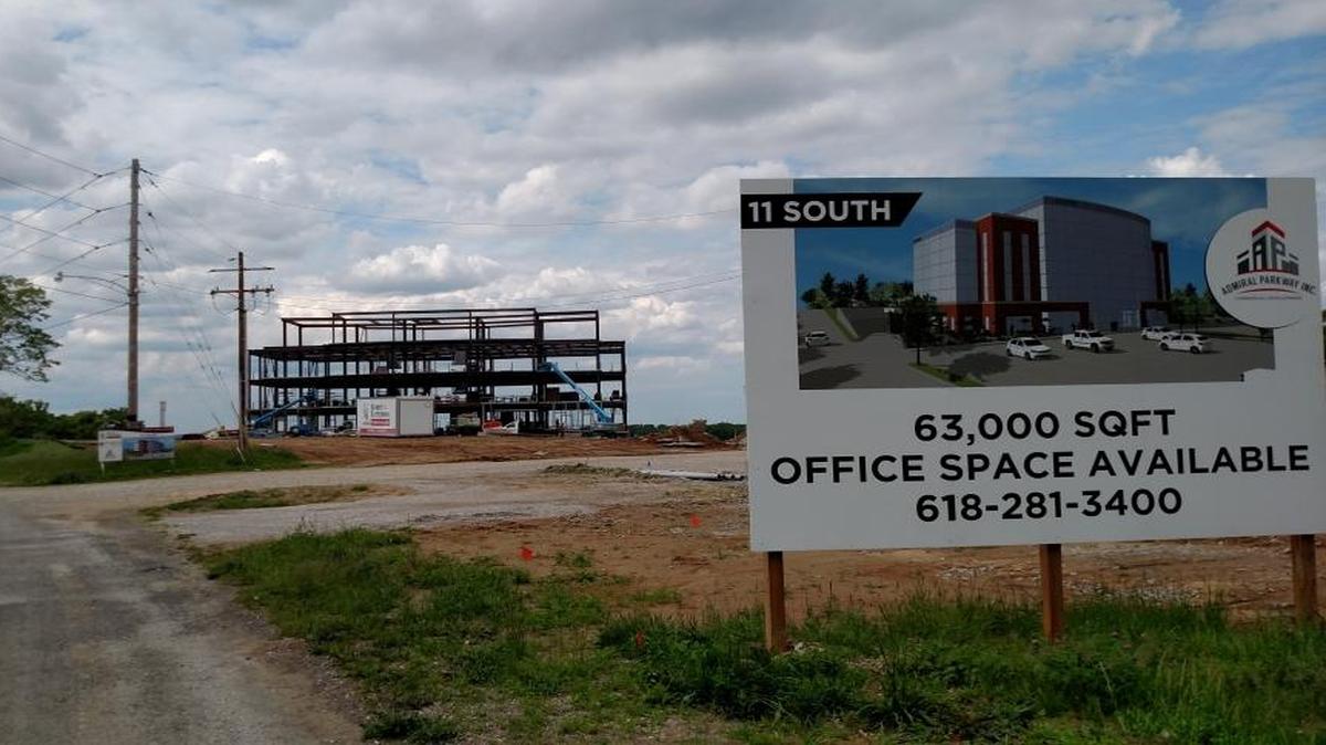 Steel beams form the skeleton of what soon will be a 63,000-square-foot office building off Sand Bank road in Columbia. Several of the building’s future tenants have been named.